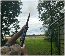 Flightline Sporting Close Up image of a man shooting a gun